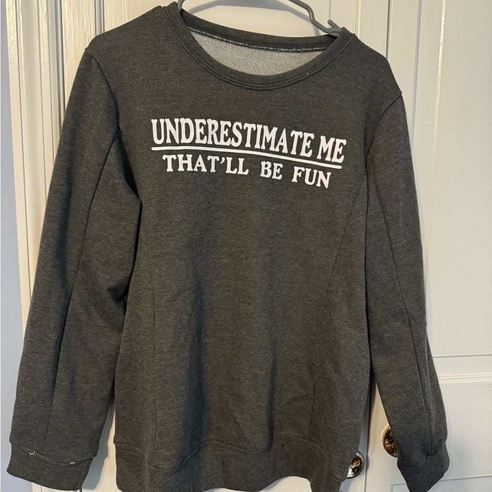 Women’s cute cozy NEW sweatshirt. “underestimate me” Empowerment. Never Worn! Lg